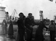 Гришин И. , Соловьев В. и девушки из Кронштадского БМК на борту Адмирала Исаченкова. Весна 1982 г.